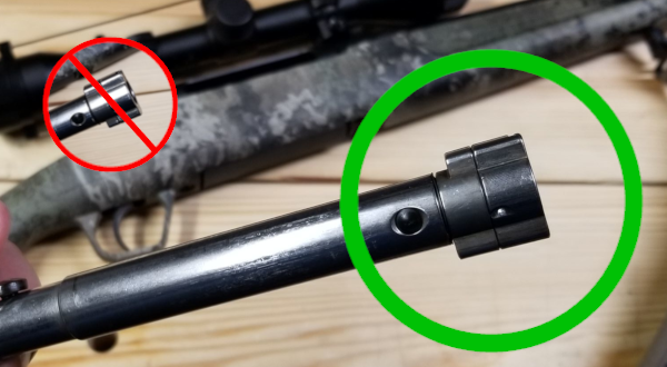 A photo of a correctly aligned Savage Axis bolt, and of an incorrectly aligned bolt.